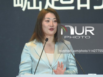 Kelly (Fuli Zong) is delivering a speech while attending a forum event in Hangzhou, China, on November 24, 2020. (