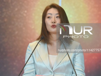 Kelly (Fuli Zong) is delivering a speech while attending a forum event in Hangzhou, China, on November 24, 2020. (