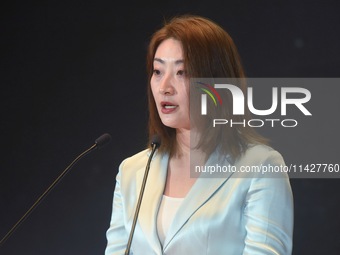 Kelly (Fuli Zong) is delivering a speech while attending a forum event in Hangzhou, China, on November 24, 2020. (