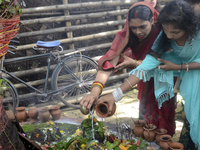 Devotees are offering prayers at Chadmoni Shiva Temple in Siliguri, India, on July 22, 2024. (