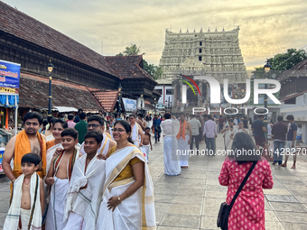 Hindu devotees are visiting the historic Sree Padmanabhaswamy Temple during the Panguni Utsavam (Painkuni Utsavam) festival in Thiruvanantha...