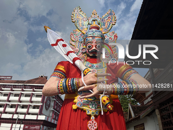 Giant idols of the Pandavas are being erected along the eastern entrance of the historic Sree Padmanabhaswamy Temple during the Panguni Utsa...