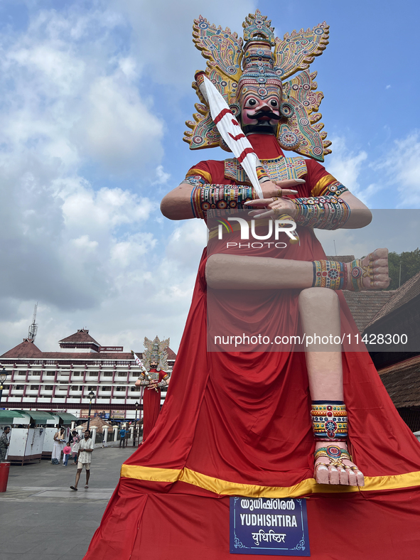 Giant idols of the Pandavas are being erected along the eastern entrance of the historic Sree Padmanabhaswamy Temple during the Panguni Utsa...