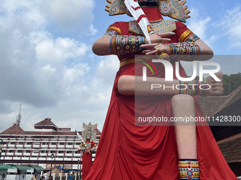 Giant idols of the Pandavas are being erected along the eastern entrance of the historic Sree Padmanabhaswamy Temple during the Panguni Utsa...