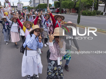 Pilgrim women from the Sierra Gorda of Queretaro are arriving at the Municipality of San Juan del Rio to continue their journey heading to t...