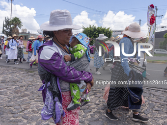 Pilgrim women from the Sierra Gorda of Queretaro are arriving at the Municipality of San Juan del Rio to continue their journey heading to t...