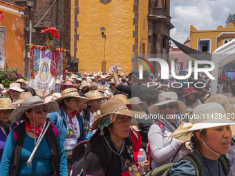 Pilgrim women from the Sierra Gorda of Queretaro are arriving at the Municipality of San Juan del Rio to continue their journey heading to t...