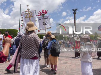 Pilgrim women from the Sierra Gorda of Queretaro are arriving at the Municipality of San Juan del Rio to continue their journey heading to t...