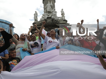 Activist Kenia Cuevas is leading a demonstration at the Angel de la Independencia for the ''Paola Buenrostro Law'', approved last Thursday b...