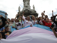 Activist Kenia Cuevas is leading a demonstration at the Angel de la Independencia for the ''Paola Buenrostro Law'', approved last Thursday b...