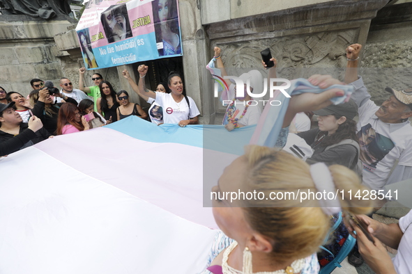 Activist Kenia Cuevas is leading a demonstration at the Angel de la Independencia for the ''Paola Buenrostro Law'', approved last Thursday b...