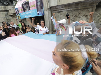 Activist Kenia Cuevas is leading a demonstration at the Angel de la Independencia for the ''Paola Buenrostro Law'', approved last Thursday b...