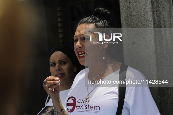 Activist Kenia Cuevas is speaking during a demonstration at the Angel de la Independencia for the ''Paola Buenrostro Law'', approved last Th...