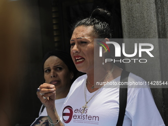 Activist Kenia Cuevas is speaking during a demonstration at the Angel de la Independencia for the ''Paola Buenrostro Law'', approved last Th...