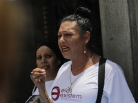 Activist Kenia Cuevas is speaking during a demonstration at the Angel de la Independencia for the ''Paola Buenrostro Law'', approved last Th...