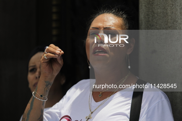 Activist Kenia Cuevas is speaking during a demonstration at the Angel de la Independencia for the ''Paola Buenrostro Law'', approved last Th...