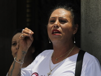 Activist Kenia Cuevas is speaking during a demonstration at the Angel de la Independencia for the ''Paola Buenrostro Law'', approved last Th...