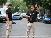 Crime scene investigators are placing evidence markers at the crime scene and are scouring the area for clues following an overnight fatal s...