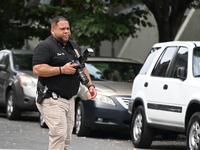 A crime scene investigator is scouring the area for clues following an overnight fatal shooting in Bronx, New York, United States, on July 2...