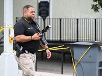 A crime scene investigator is scouring the area for clues following an overnight fatal shooting in Bronx, New York, United States, on July 2...