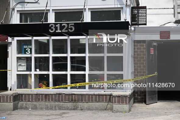 Police are taping off 41-year-old Raheem Blake's residence with crime scene tape following an overnight fatal shooting in Bronx, New York, U...