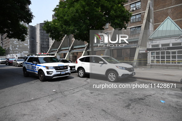 Police are taping off 41-year-old Raheem Blake's residence with crime scene tape following an overnight fatal shooting in Bronx, New York, U...