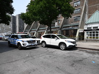 Police are taping off 41-year-old Raheem Blake's residence with crime scene tape following an overnight fatal shooting in Bronx, New York, U...