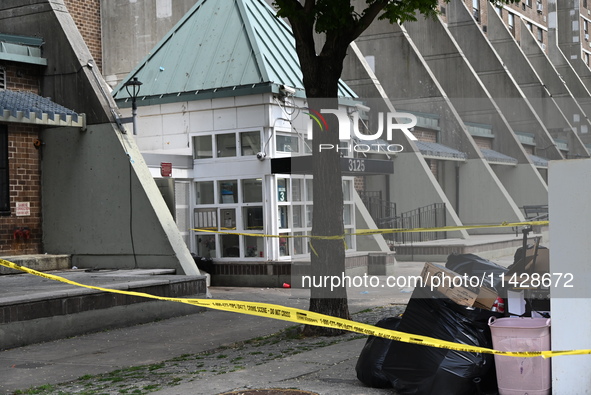 Police are taping off 41-year-old Raheem Blake's residence with crime scene tape following an overnight fatal shooting in Bronx, New York, U...