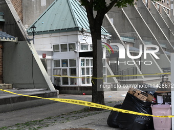 Police are taping off 41-year-old Raheem Blake's residence with crime scene tape following an overnight fatal shooting in Bronx, New York, U...