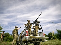 Fighters of the Separate Anti-Aircraft Machine Gun Battalion, who are providing air cover for unmanned aerial vehicles and destroying target...