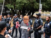 Pro-Palestinian activists demonstrate near the Watergate hotel ahead of the visit of Israeli Prime Minister Benjamin Netanyahu in Washington...