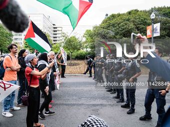 Pro-Palestinian activists demonstrate near the Watergate hotel ahead of the visit of Israeli Prime Minister Benjamin Netanyahu in Washington...