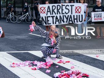 Pro-Palestinian activists demonstrate near the Watergate hotel ahead of the visit of Israeli Prime Minister Benjamin Netanyahu in Washington...