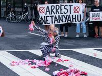 Pro-Palestinian activists demonstrate near the Watergate hotel ahead of the visit of Israeli Prime Minister Benjamin Netanyahu in Washington...