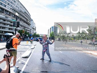 Pro-Palestinian activists demonstrate near the Watergate hotel ahead of the visit of Israeli Prime Minister Benjamin Netanyahu in Washington...