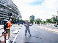 Pro-Palestinian activists demonstrate near the Watergate hotel ahead of the visit of Israeli Prime Minister Benjamin Netanyahu in Washington...