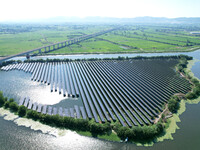 A 20MW distributed photovoltaic power station of the fishery-solar hybrid project is being shown in Xiage town of Chaohu city, in Chaohu, Ch...