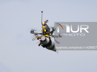 A kamikaze drone with a warhead is performing a demonstration flight during the 2nd Drone Racing Tournament by the Federation of Military Te...