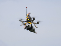 A kamikaze drone with a warhead is performing a demonstration flight during the 2nd Drone Racing Tournament by the Federation of Military Te...