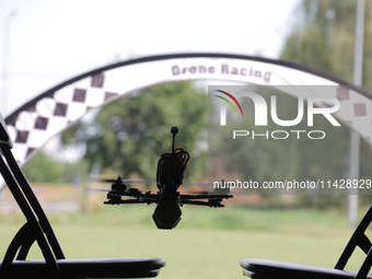 A drone is flying during the 2nd Drone Racing Tournament by the Federation of Military Technological Sports of Ukraine in Bilohorodka, Kyiv...