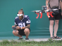 A participant in the 2nd Drone Racing Tournament by the Federation of Military Technological Sports of Ukraine is flying a drone in Bilohoro...