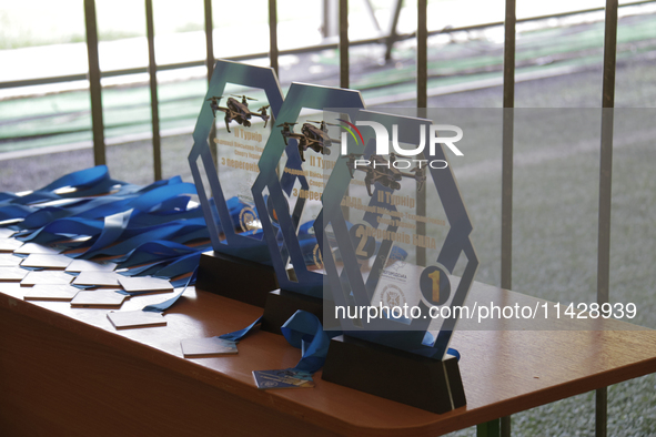 Awards for the winners of the 2nd Drone Racing Tournament by the Federation of Military Technological Sports of Ukraine are flying a drone i...