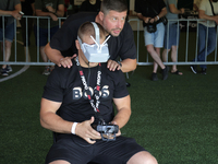 A participant in the 2nd Drone Racing Tournament by the Federation of Military Technological Sports of Ukraine is setting up a drone in Bilo...