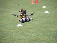 A kamikaze drone with a warhead is performing a demonstration flight during the 2nd Drone Racing Tournament by the Federation of Military Te...