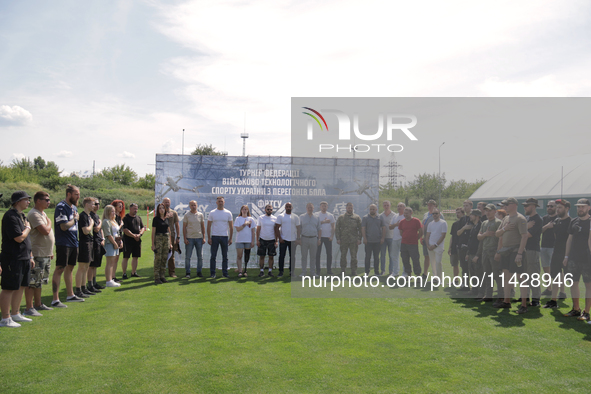 Participants in the 2nd Drone Racing Tournament by the Federation of Military Technological Sports of Ukraine are posing for a picture in Bi...