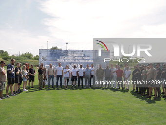 Participants in the 2nd Drone Racing Tournament by the Federation of Military Technological Sports of Ukraine are posing for a picture in Bi...