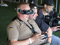 A participant in the 2nd Drone Racing Tournament by the Federation of Military Technological Sports of Ukraine is flying a drone in Bilohoro...