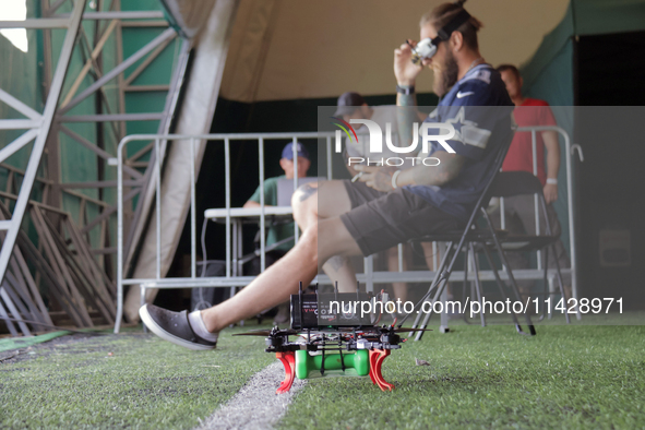 A cargo drone is being seen during the 2nd Drone Racing Tournament by the Federation of Military and Technological Sports of Ukraine in Bilo...