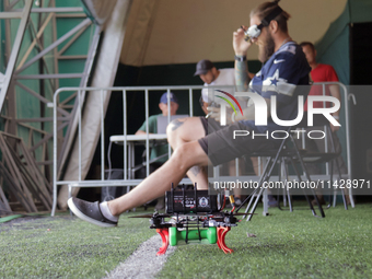 A cargo drone is being seen during the 2nd Drone Racing Tournament by the Federation of Military and Technological Sports of Ukraine in Bilo...