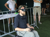 A participant in the 2nd Drone Racing Tournament by the Federation of Military Technological Sports of Ukraine is flying a drone in Bilohoro...